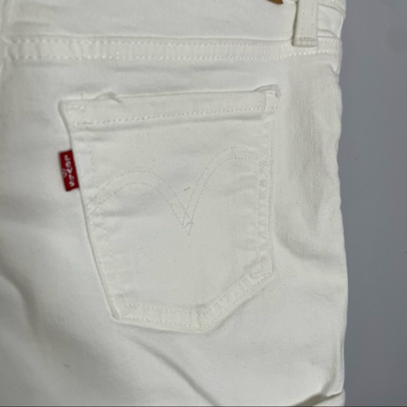 Levi’s Distressed Mid-Length White Shorts - Picture 6 of 9